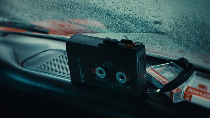 Cassette recorder on a car dashboard from Singer