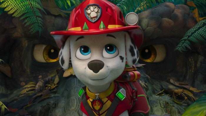 Marshall from PAW Patrol with a dinosaur behind him
