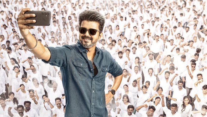 Actor Vijay taking a selfie with a crowd