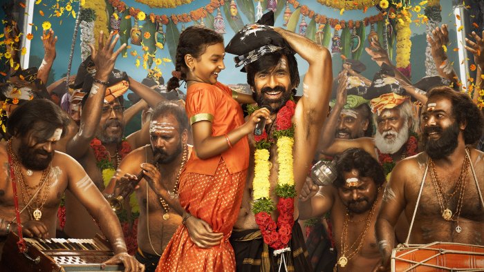 Ravi Teja Holding a Child in Irumudi