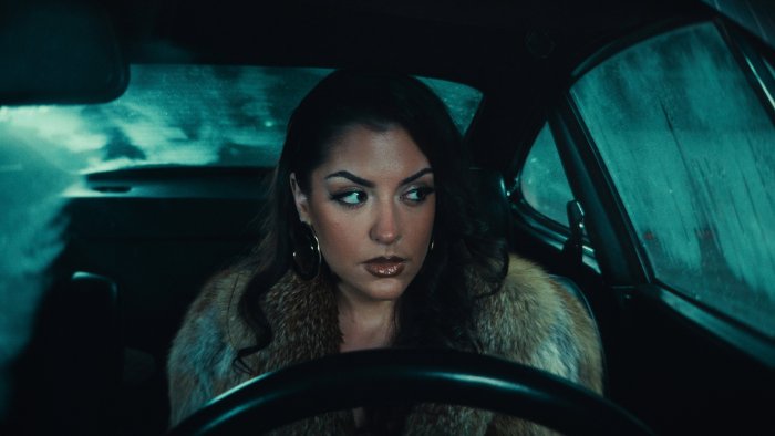Woman in Fur Coat Driving in Singer