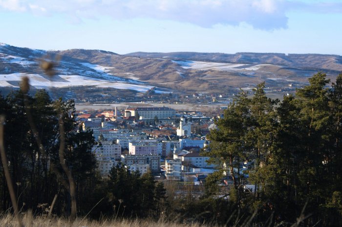 View of a small city nestled in a valley
