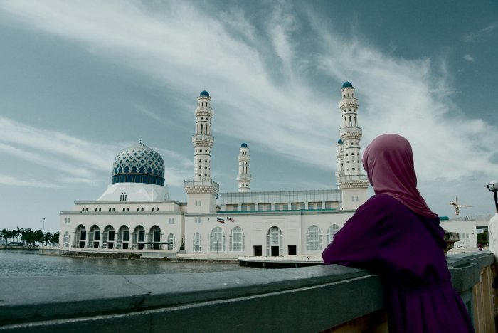 Woman in Hijab Looking at Kota Kinabalu City Mosque