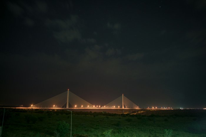 Illuminated Kota Hanging Bridge at Night