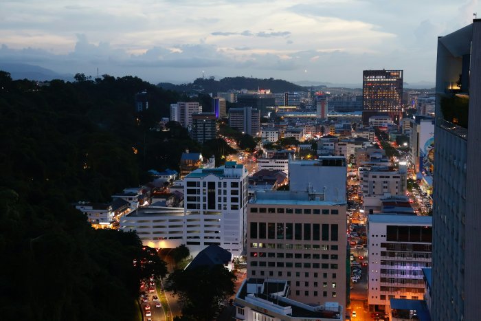 City Skyline with Illuminated Buildings at Dusk
