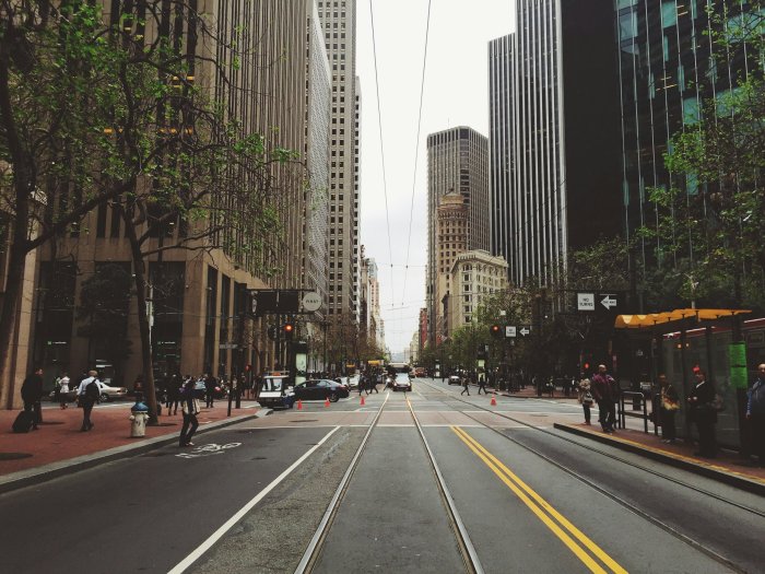 Urban Street View with Tram Tracks and Skyscrapers