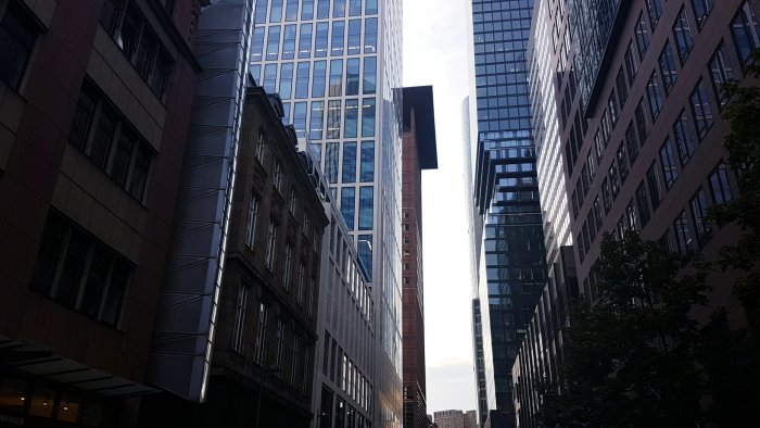 Low-Angle View of Modern and Historic Skyscrapers