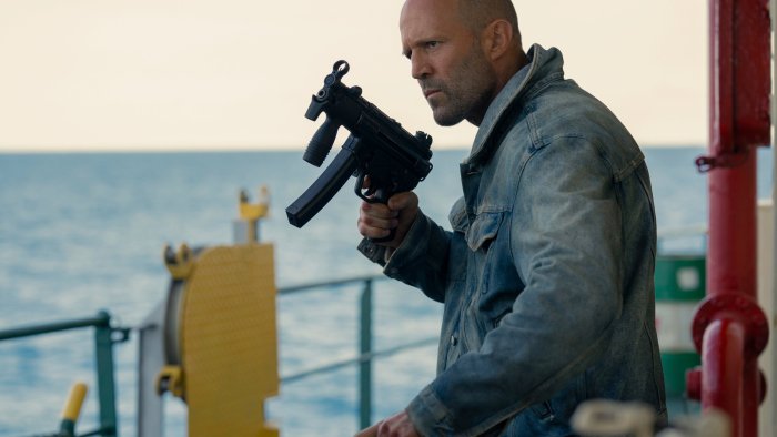 Jason Statham holding a gun in Mutiny