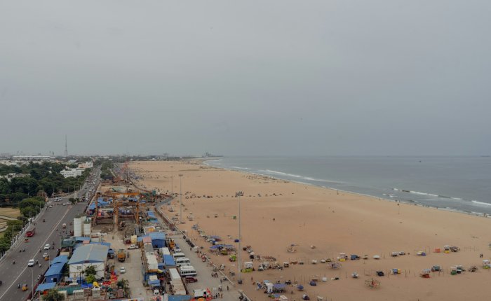 Aerial view of a wide sandy beach and ocean