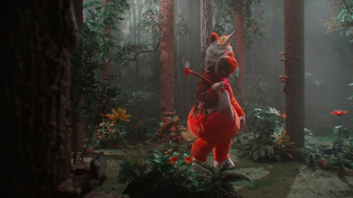 Orange Unicorn Mascot Holding Axe in Buddy