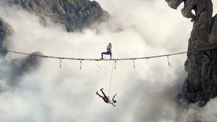 Characters on a high rope bridge in Fall 2: Deadpoint