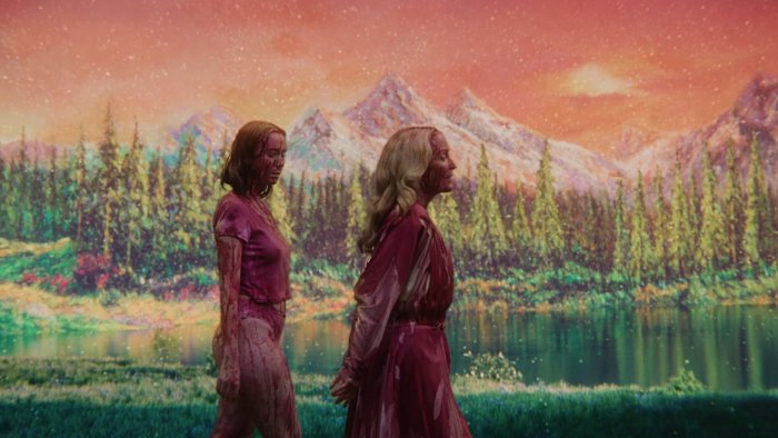 Two blood-covered women in Teenage Sex and Death at Camp Miasma