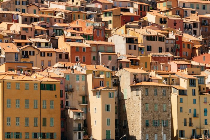 Dense colorful buildings in a Mediterranean coastal town
