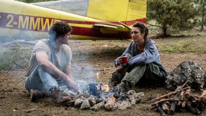 Man and Woman by Campfire in The Dog Stars