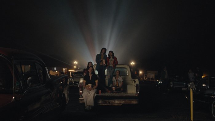 Group of Friends at a Drive-In Movie Theater
