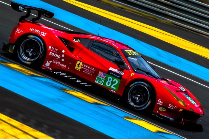 Red Ferrari 488 GTE Race Car on Track
