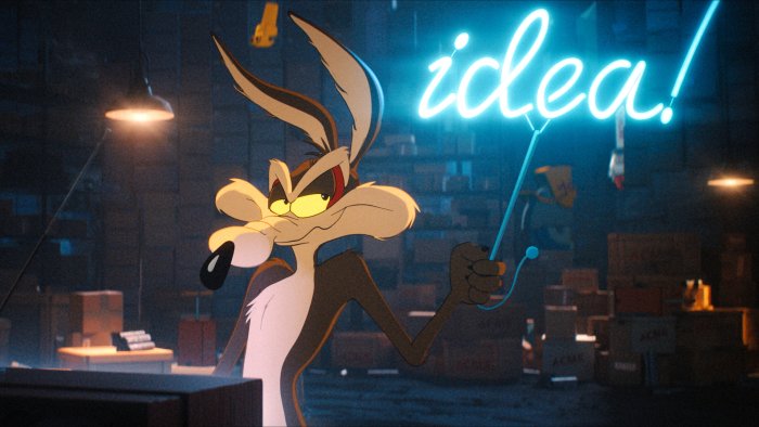 Wile E. Coyote holding a neon idea sign