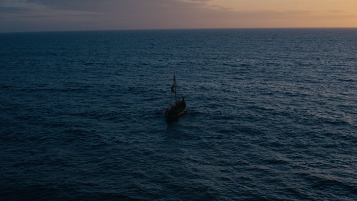 Ancient Greek ship on the ocean in The Odyssey