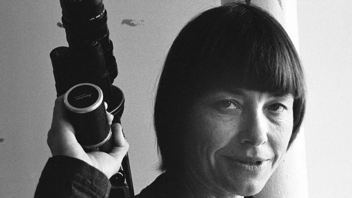 Barbara Hammer holding a camera in Barbara Forever