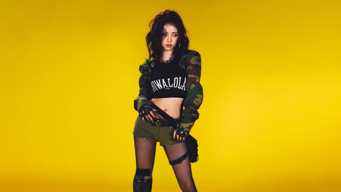 Karina of aespa in Camouflage Outfit on Yellow Background