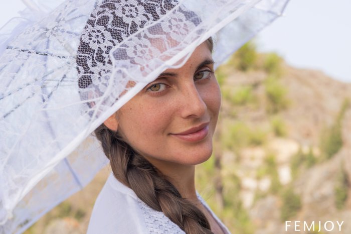Smiling Woman with White Lace Parasol