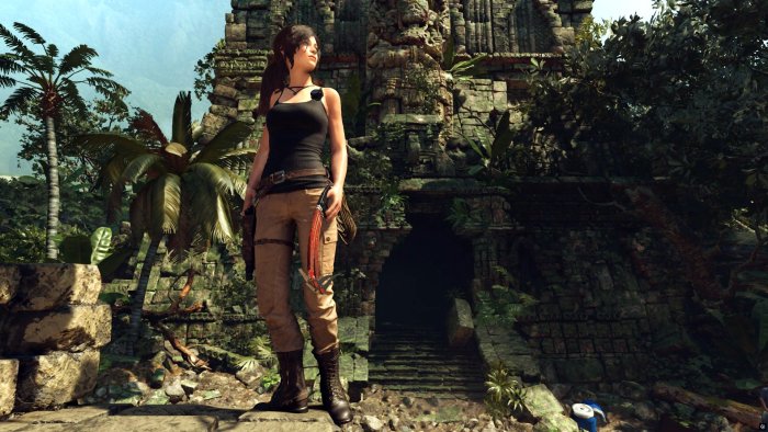 Lara Croft at a jungle temple entrance in Tomb Raider