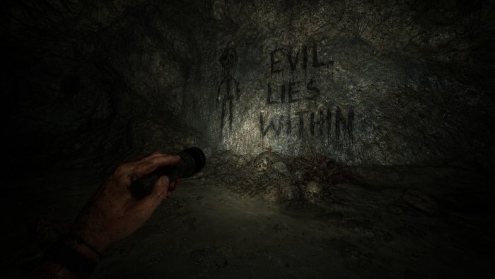 Outlast 2 cave graffiti screenshot