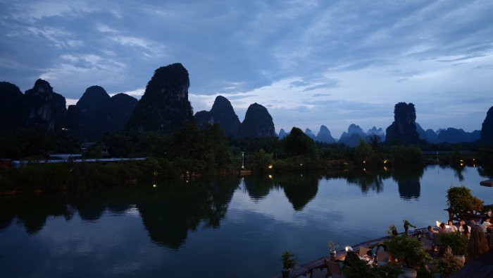 Karst Mountains and River at Twilight