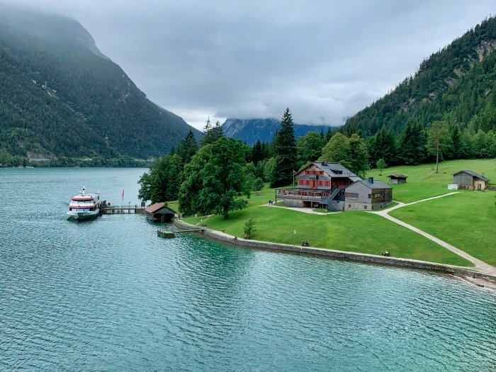 Lakeside House and Boat at Lake Achensee Austria