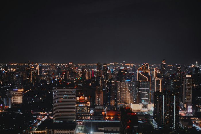 City Skyline at Night with Glowing Lights