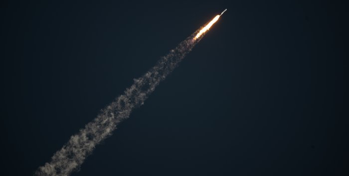 SpaceX Falcon Heavy Rocket Launching into Space