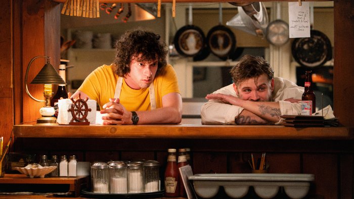 Two Men Behind a Diner Counter in Tony