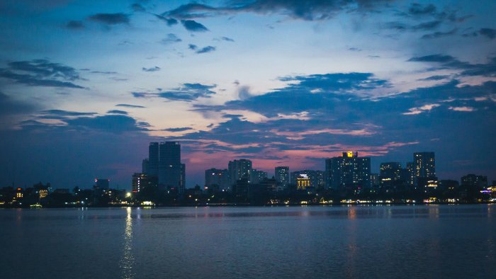 City Skyline Across Water at Dusk