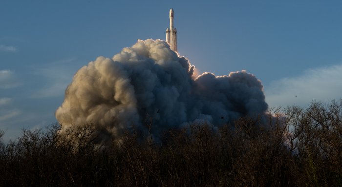 SpaceX Falcon Heavy Rocket Launching into the Sky
