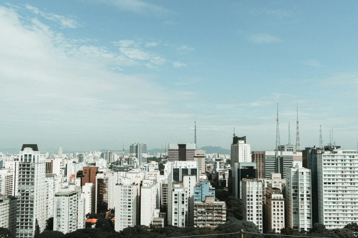 Dense City Skyline of São Paulo Under Blue Sky