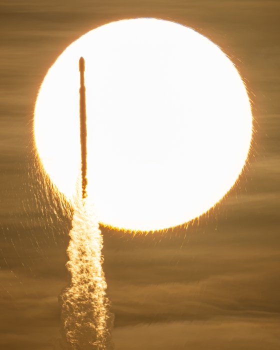 Falcon Heavy Rocket Launch Silhouetted Against the Sun