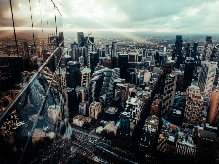 Aerial View of Dense City Skyscrapers with Glass Reflection