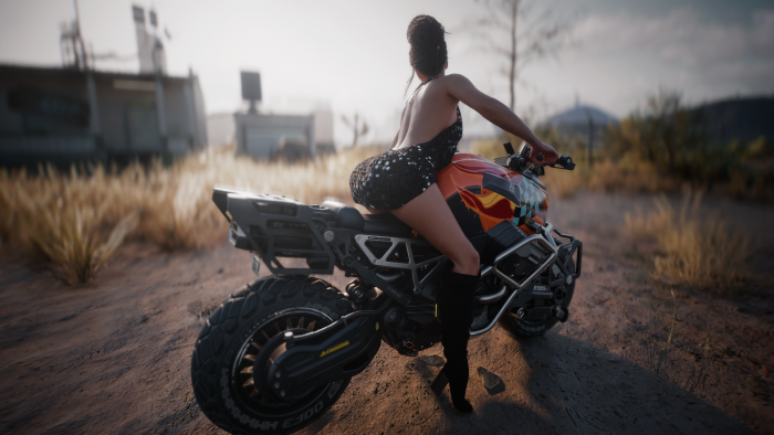 Female V on a motorcycle in Cyberpunk 2077