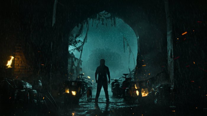 Man standing in rainy archway from The Paradise