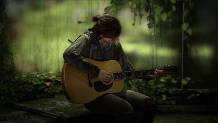 Ellie playing guitar in The Last of Us Part II