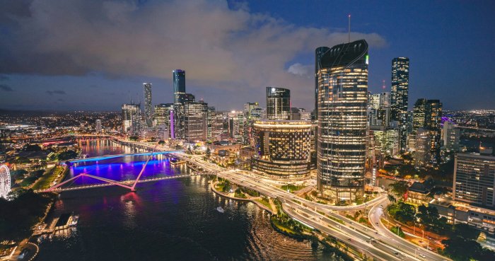 Brisbane skyline at night with illuminated bridges