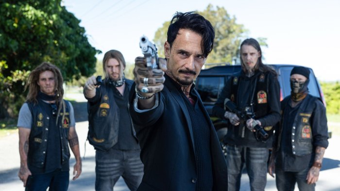 Men with guns from the movie Runner