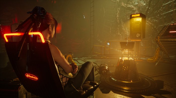 Woman in futuristic chair near a phone booth