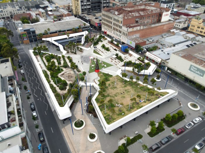 Aerial view of Prahran Square with green spaces and buildings
