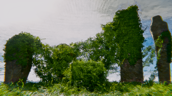 Ancient stone pillars overgrown with lush green ivy