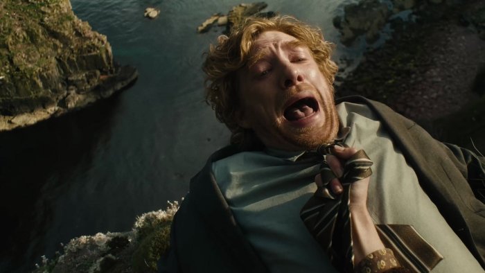 Man screaming on a cliff edge