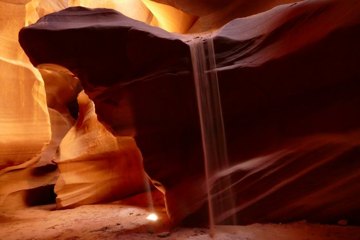 Sandfall in a desert canyon