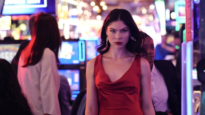 Woman in red dress in a casino