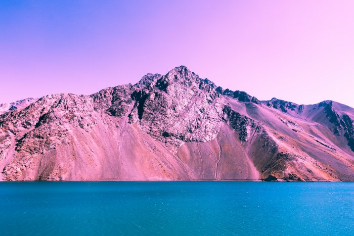 Pink Mountains Overlooking Turquoise Water