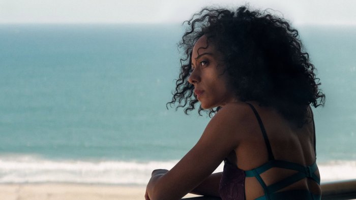Woman looking out at the ocean